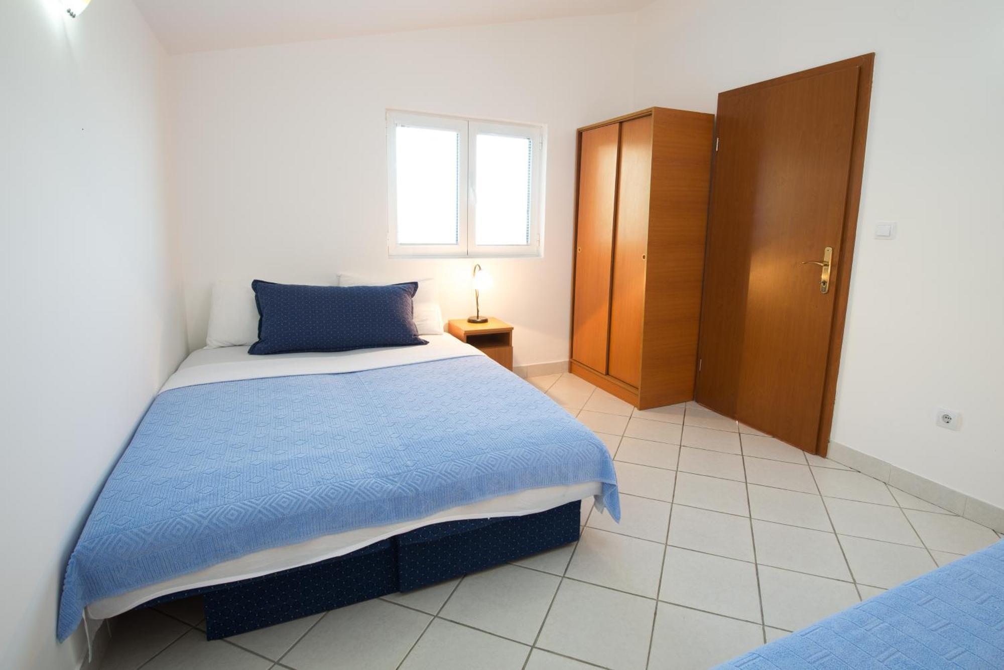 Apartments Dragisic Ilha Sveti Stefan Quarto foto