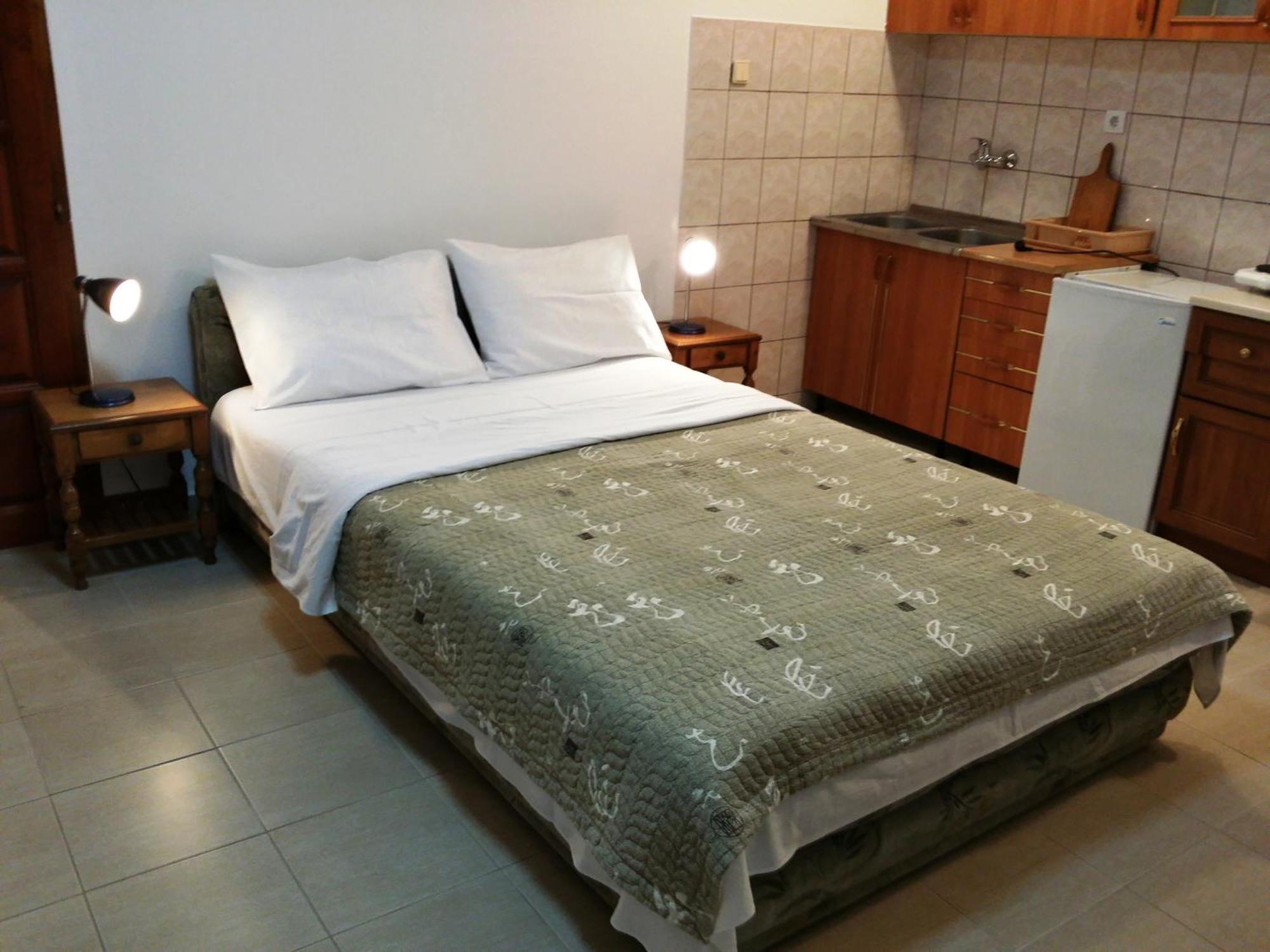Apartments Dragisic Ilha Sveti Stefan Quarto foto